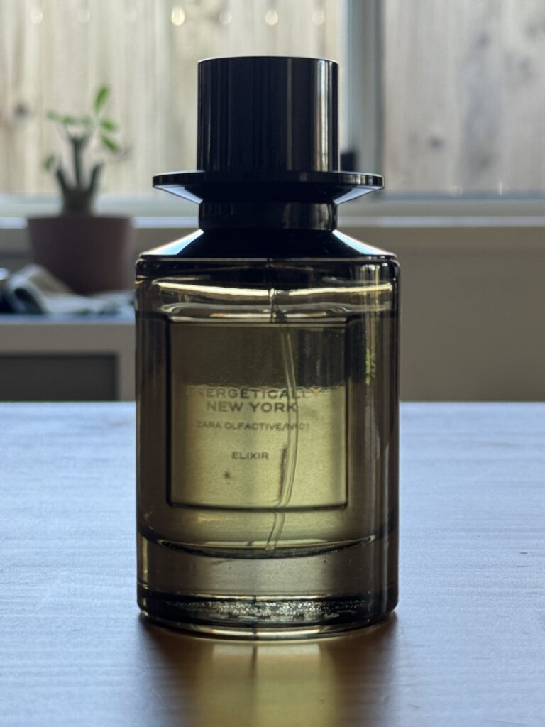 Close-up of Zara Energetically New York Elixir fragrance bottle showing glass design and branding
