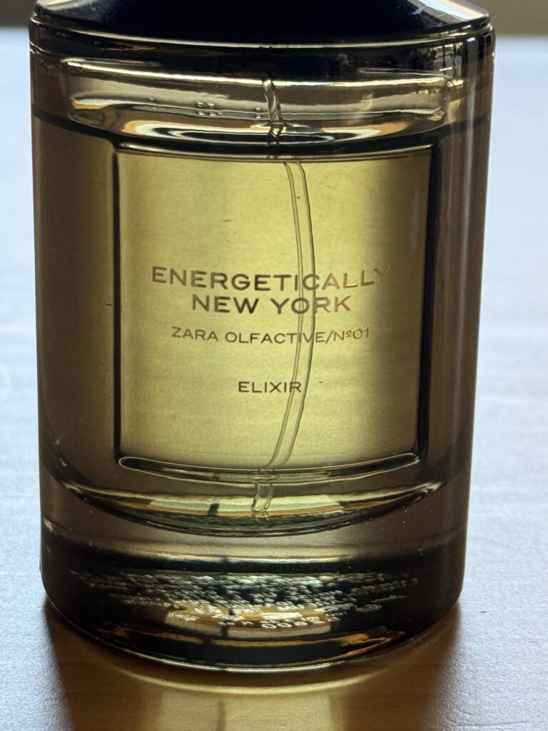 Close-up of Zara Energetically New York Elixir bottle showing engraved branding on the glass