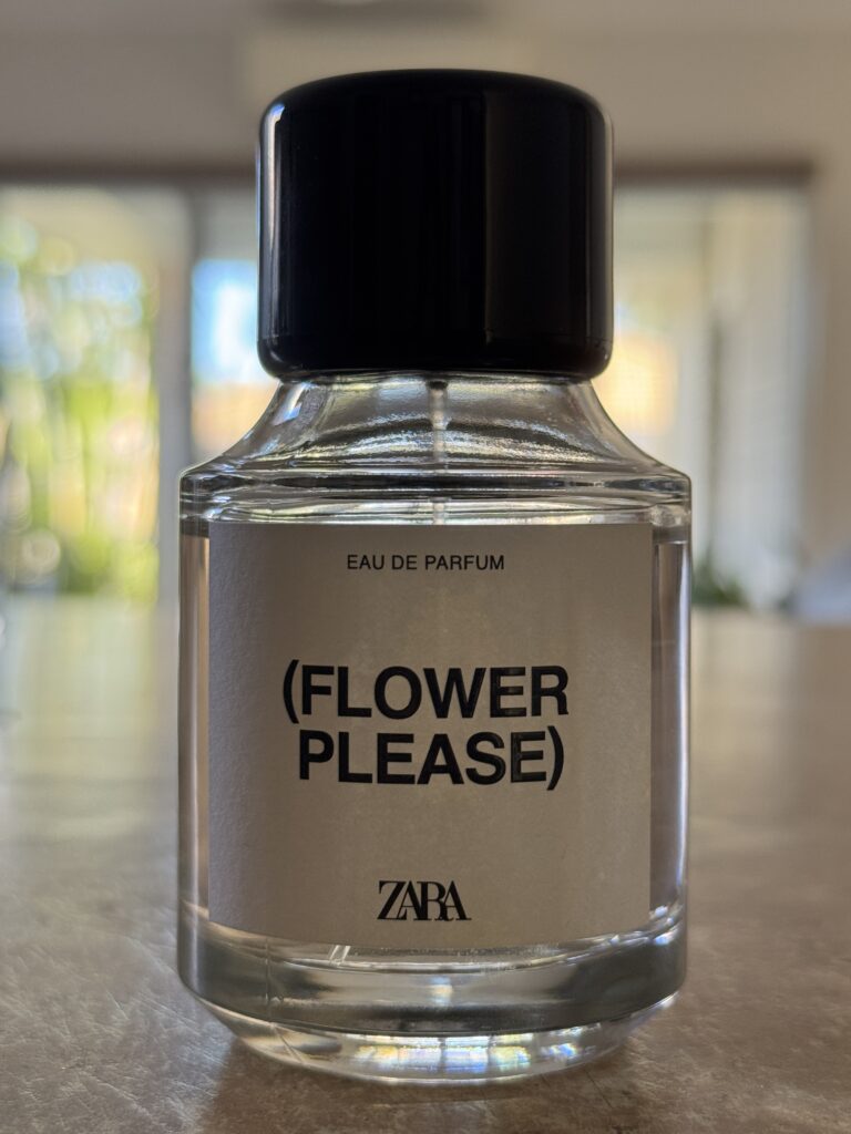 Zara Flower Please perfume bottle photographed indoors in natural light