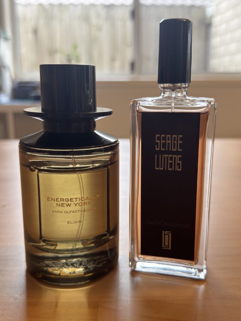 Santal Majuscule vs Zara Energetically New York Elixir fragrance bottles close up