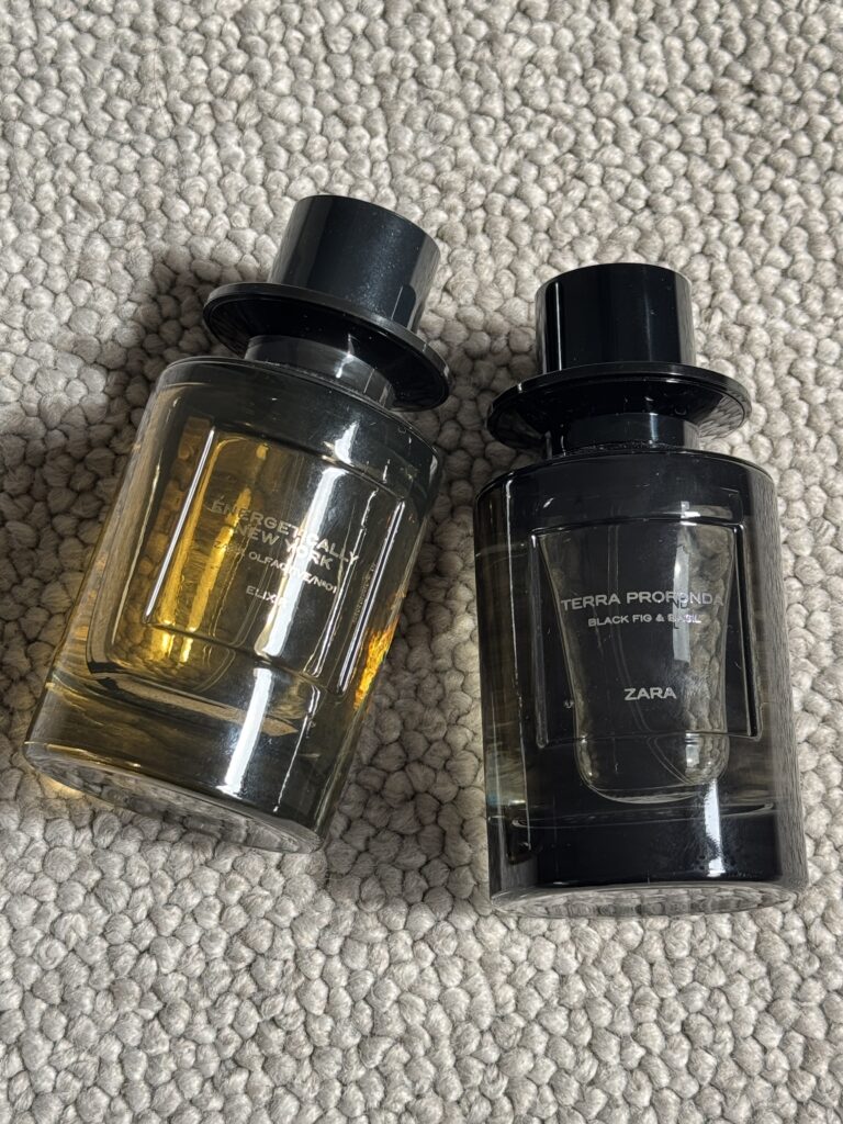 Zara Terra Profonda and Energetically New York Elixir bottles on a carpet